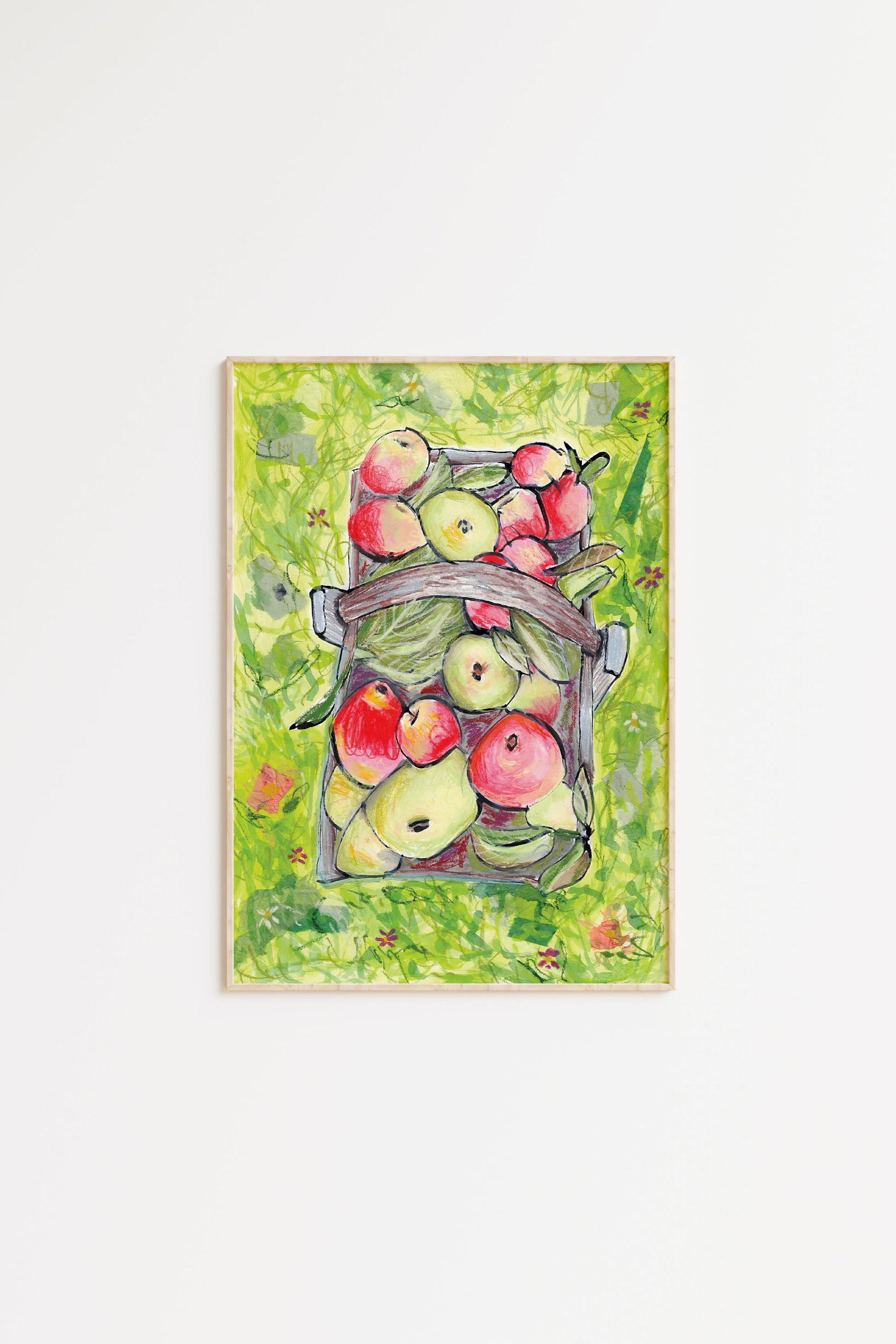 Framed artwork of apples on a green background