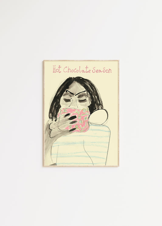 Illustration of a person drinking from a mug with 'Hot Chocolate Season' text on a light background