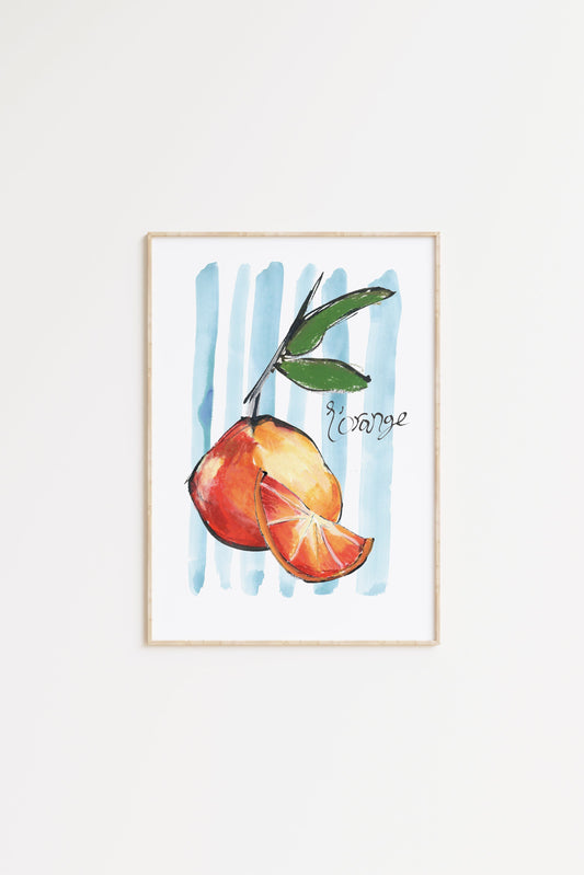 Framed artwork of an orange with leaves and a sliced orange on a white background