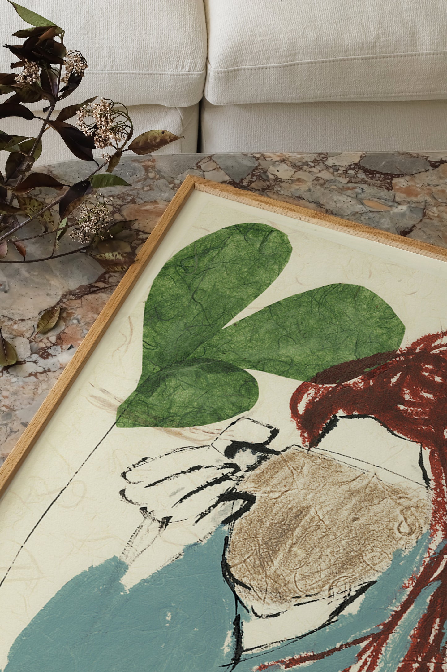 Framed Illustration of a girl wearing a blue top, drinking from a brown mug.