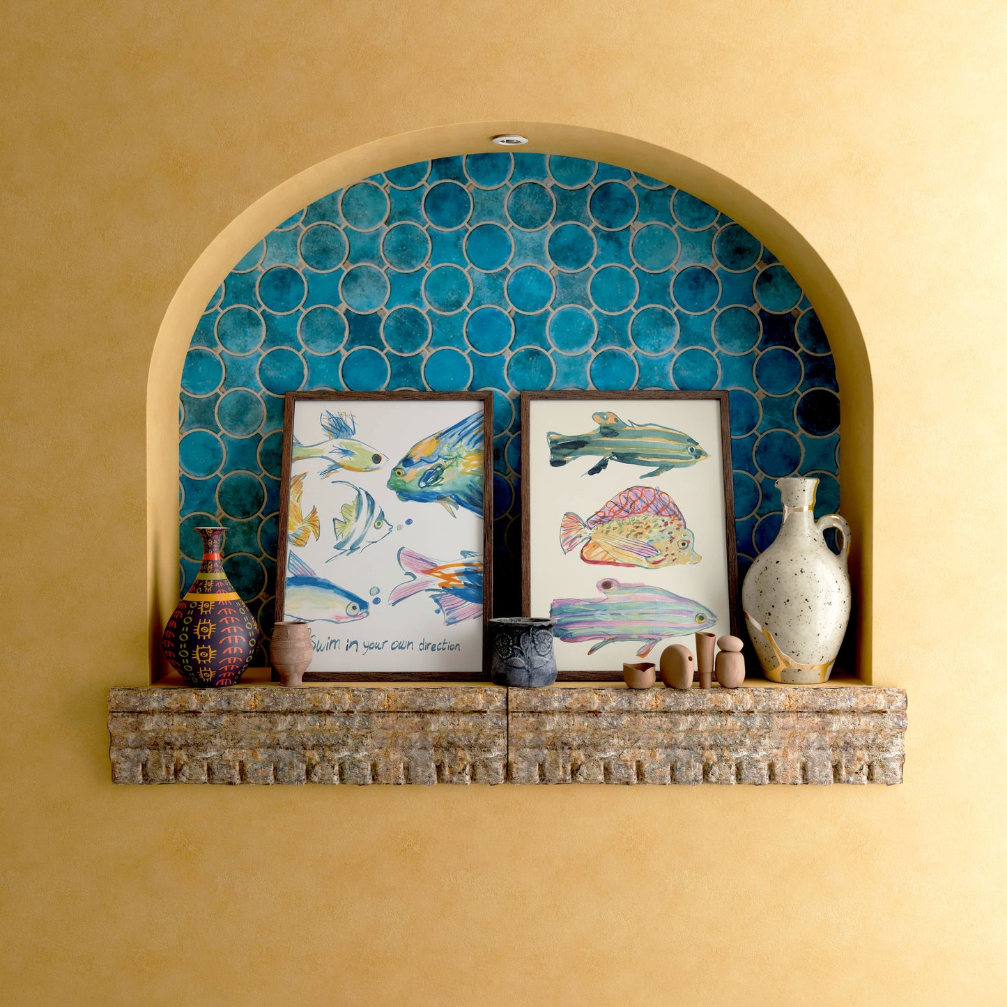 Decorative shelf with fish-themed artwork and vases against a blue tiled wall.