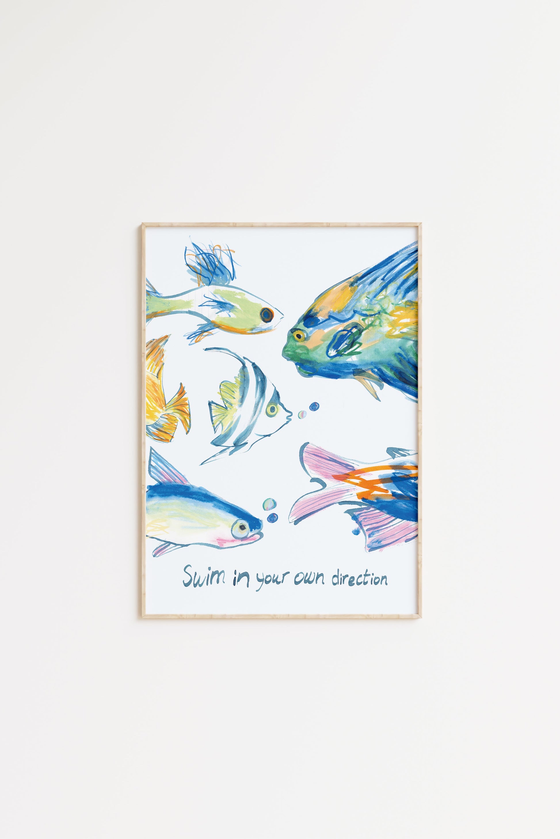 Framed artwork with colorful fish illustration on a light blue background