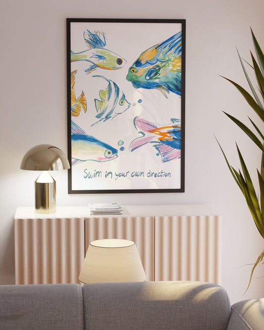 Framed artwork with colorful fish on a wall above a console table in a room.