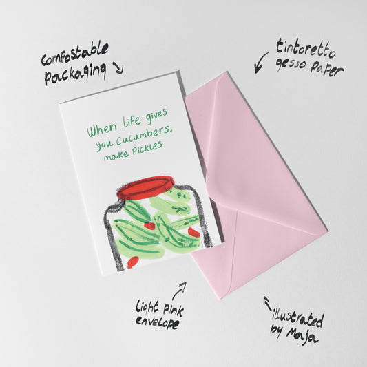 Greeting card with a jar of pickles illustration and light pink envelope on a white background
